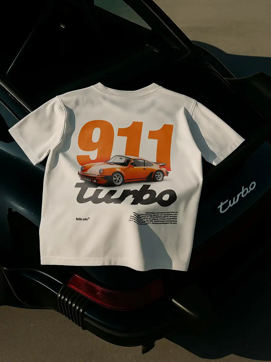 White t-shirt with Porsche 911 Turbo design on a car spoiler