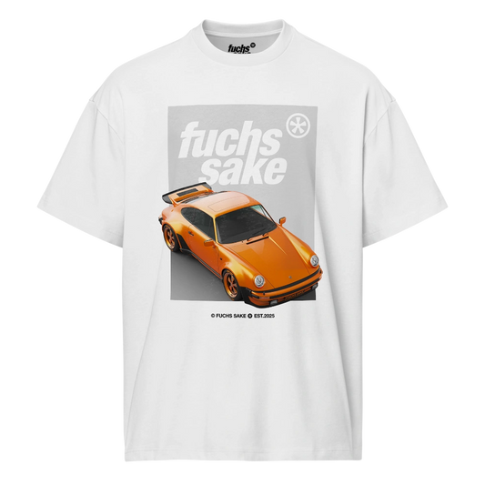White t-shirt with an orange Porsche graphic and 'fuchs sake' text on a white background
