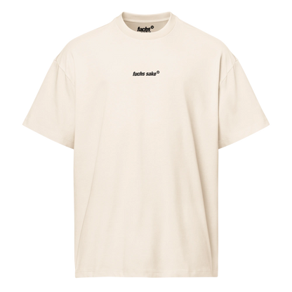 Beige t-shirt with black text on a white background