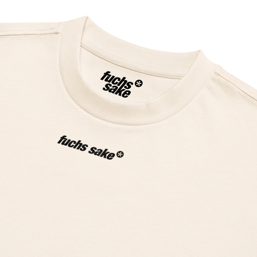 Beige t-shirt with 'fuchs sake' text on a white background