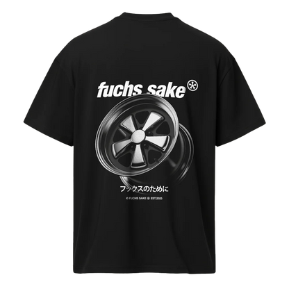 Black t-shirt with 'fuchs sake' graphic and fuchs wheel on a white background