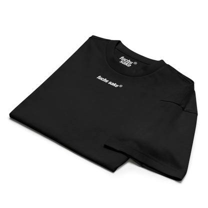 Folded black tshirt with a brand logo on a white background